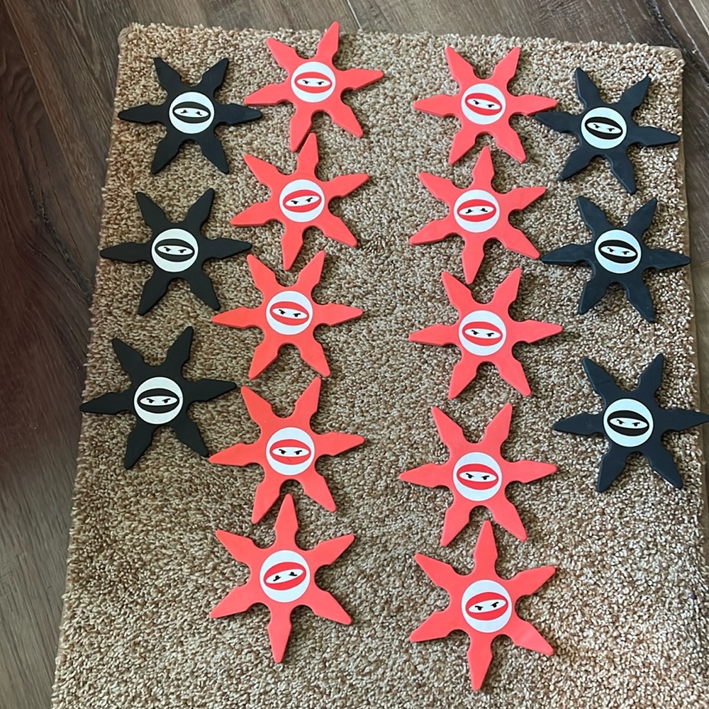 Funexpress 16 toy foam black and orange Ninja Stars